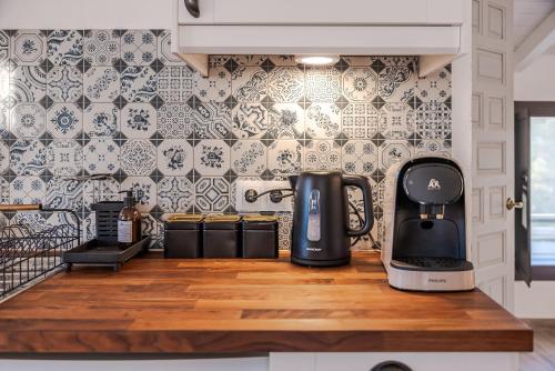 a coffee maker on a counter in a kitchen at Finca Gran Cerros in Alora