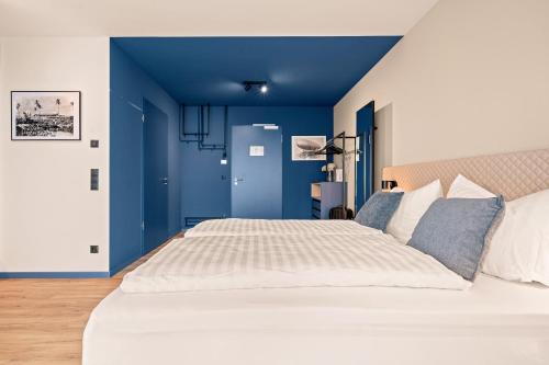 Ένα ή περισσότερα κρεβάτια σε δωμάτιο στο Motel42-Temporary Living