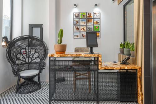 an office with a desk and a chair at The Bear and Ween in St Julian's