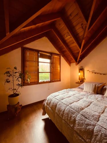 Ένα ή περισσότερα κρεβάτια σε δωμάτιο στο B&B Casa Nómada
