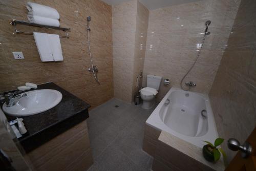 Ванная комната в Silver Green Hotel