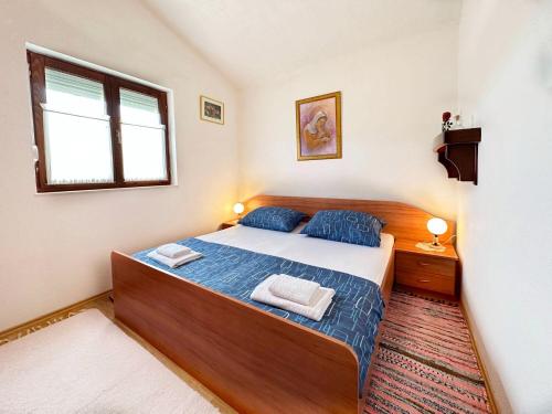 Postel nebo postele na pokoji v ubytování House Tamy - with jacuzzi