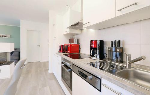 Η κουζίνα ή μικρή κουζίνα στο Skipper Apartment 622