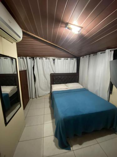 Katil atau katil-katil dalam bilik di Apartamentos no centro