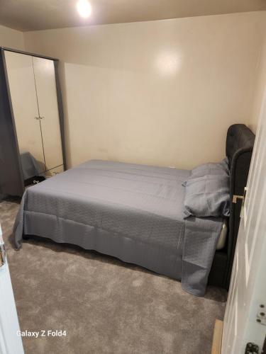 a bedroom with a bed in a room at 69 swan lane in Coventry