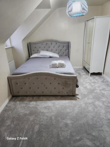 a bedroom with a bed in a room at 69 swan lane in Coventry