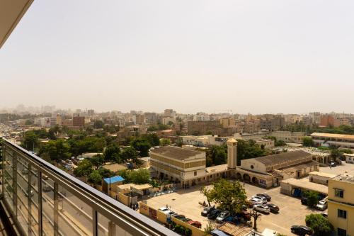 a view of a city from a balcony at Chambres meublées Avenue Cheikh Anta Diop in Dakar