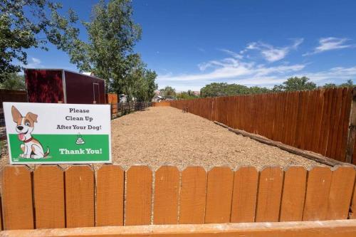 a fence with a sign on the side of it at Desert Glamping Getaway Near Moab Arches NP in Moab