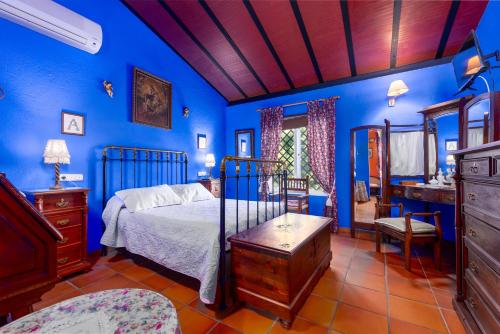 Postel nebo postele na pokoji v ubytování Villa Palladio en Ronda