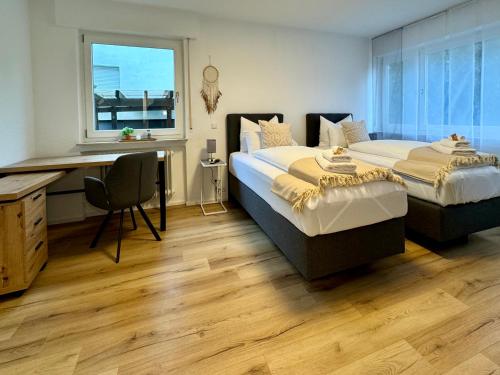 Ένα ή περισσότερα κρεβάτια σε δωμάτιο στο 3 Zimmer Apartment, 82 qm, max 5 Pers, Balkon, Garage, Internet 300 mBit