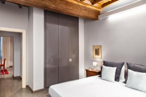 Postel nebo postele na pokoji v ubytování Appartamento Roma Coronari Suite