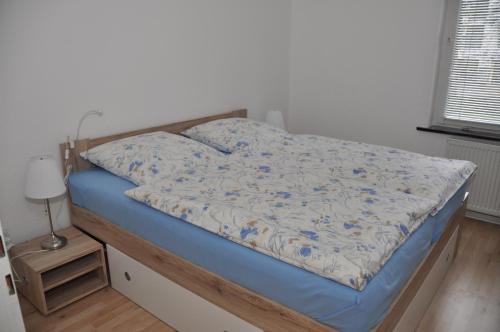 Ліжко або ліжка в номері Ferienwohnung Martin 1