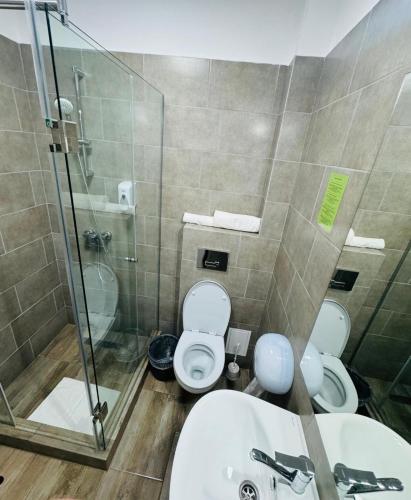 Koupelna v ubytování Stef Rooms