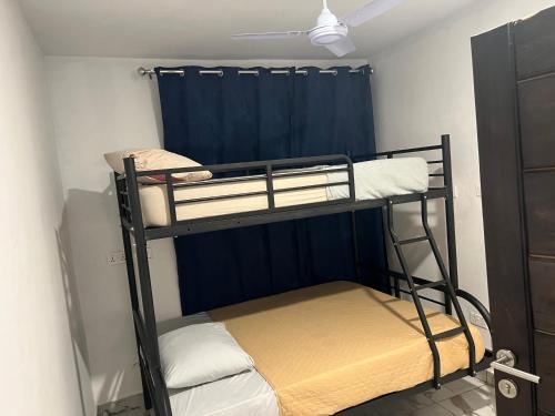Voodi või voodid majutusasutuse Imani Court Luxury Apartments toas