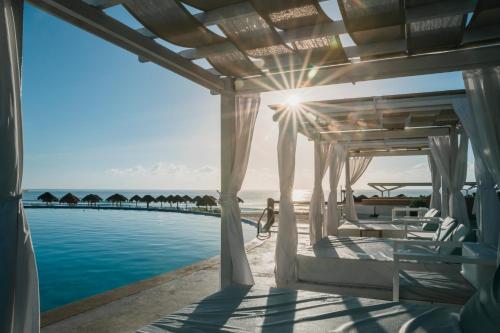 a villa with a view of the ocean at Iberostar Selection Cancun - All Inclusive in Cancún