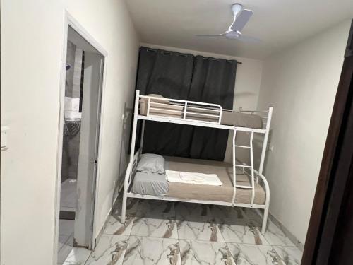 Voodi või voodid majutusasutuse Imani Court Luxury Apartments toas