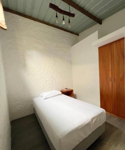 Llit o llits en una habitació de Villa Kamila2
