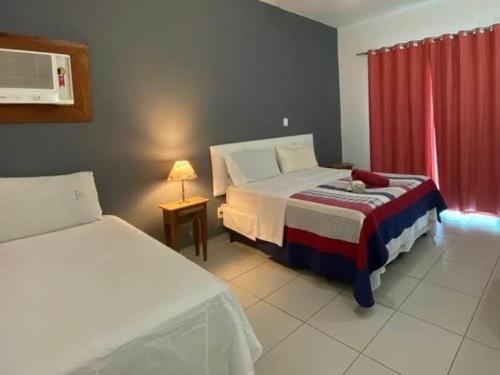 Ένα ή περισσότερα κρεβάτια σε δωμάτιο στο Casa Marina vip