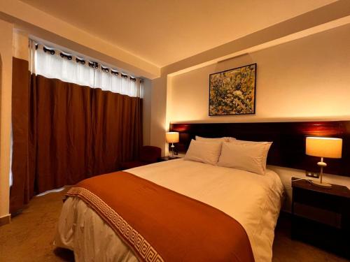 Postel nebo postele na pokoji v ubytování PisonayMapiHotelBoutique
