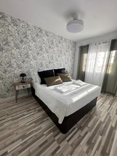 En eller flere senge i et værelse på La Finca Chayofa Holiday