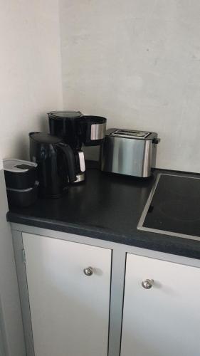 Una cocina o cocineta en De Kluiskaemer in de Olde Banck