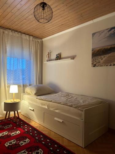 Postel nebo postele na pokoji v ubytování Ferienhaus an der Uniklinik
