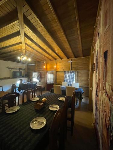 a dining room with a table and some chairs at aynur hanım konağı butik otel in Şahinbey