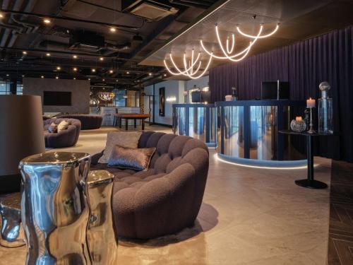 Posezení v ubytování Dorint Resort & Spa Locarno-Riazzino - New Opening
