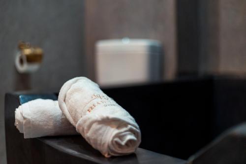 a roll of toilet paper sitting on top of a table at Riad L'ECOLE in Marrakech