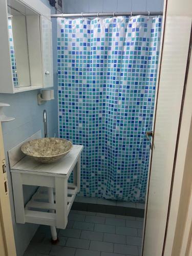 a bathroom with a sink and a shower at SANBERJERE in San Bernardo