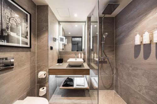 Koupelna v ubytování Radisson Hotel Leipzig