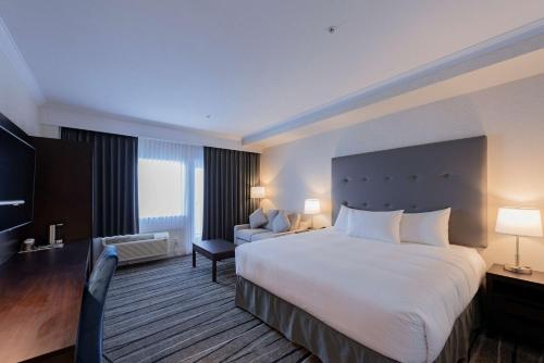 Ein Bett oder Betten in einem Zimmer der Unterkunft Prestige Treasure Cove Resort, WorldHotels Elite