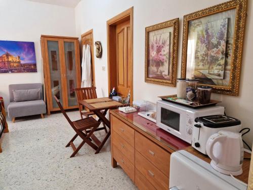 Kuchyň nebo kuchyňský kout v ubytování Saracini's Homestay