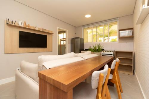 TV a/nebo společenská místnost v ubytování 360 Av Ipiranga