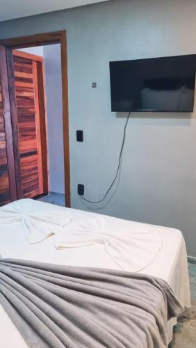 Μια τηλεόραση ή/και κέντρο ψυχαγωγίας στο Milos Hotel Icaraizinho