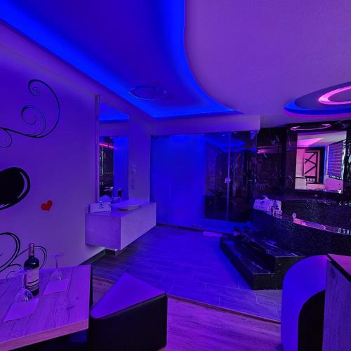 a room with purple lights in a building at Hotel City Lights in Mexico City