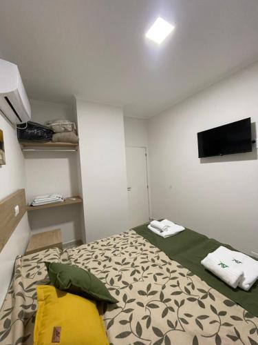 Una cama o camas en una habitación de Agua de vida Chajari