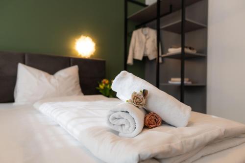 Una cama o camas en una habitación de Florum Hotel