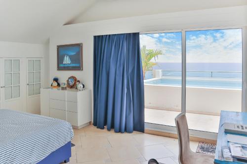 Ένα ή περισσότερα κρεβάτια σε δωμάτιο στο Sapphire Penthouse