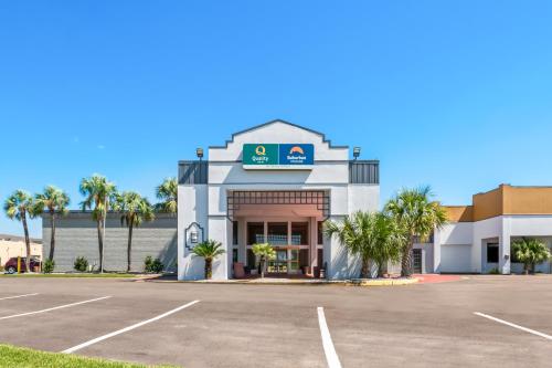a building with a parking lot in front of it at Quality Inn Slidell I-10 in Slidell