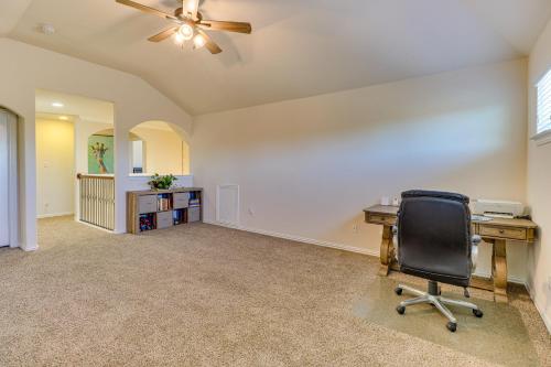 an empty office with a desk and a chair at Pet-Friendly Leander Home with Fully Fenced Yard! in Leander
