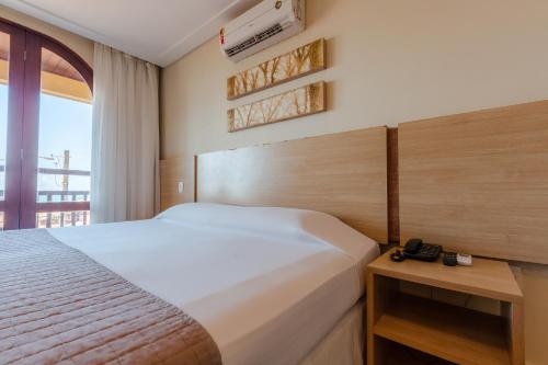 Katil atau katil-katil dalam bilik di Rede Andrade Comfort