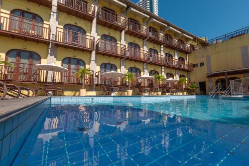 Kolam renang di atau dekat dengan Rede Andrade Comfort