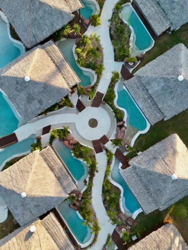 an overhead view of roofs in a neighborhood at Alma Charme Atins in Atins