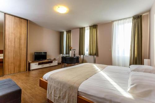 Ένα ή περισσότερα κρεβάτια σε δωμάτιο στο Apartments Frajona