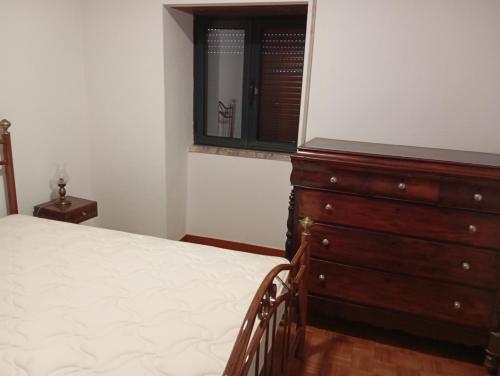 Ένα ή περισσότερα κρεβάτια σε δωμάτιο στο Casa da Avó Bia