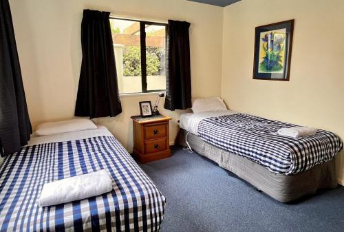 Una cama o camas en una habitación de Rifugio - Lake Tekapo