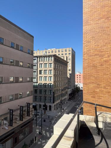 a view of a city street with tall buildings at The Historic Lyric Penthouse with Private Rooftop in Cincinnati