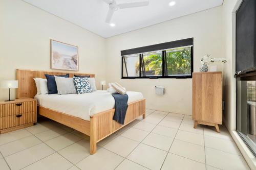 Ένα ή περισσότερα κρεβάτια σε δωμάτιο στο The Garden Nook Clifton Beach