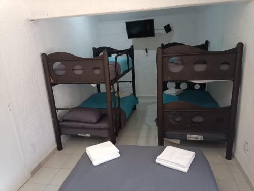 Ένα ή περισσότερα κρεβάτια σε δωμάτιο στο Casa Pok Ta Pok